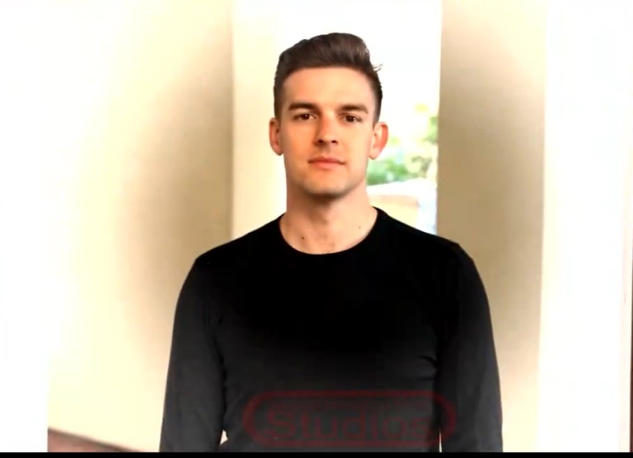 Screenshot of MatPat
              standing infront of Scott Cawthon's house staring blankly at the
              camera